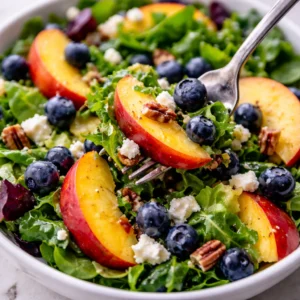 Delicious Peach Blueberry Salad with fresh peaches and blueberries, served in a bowl