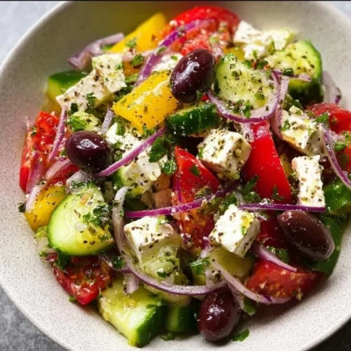 Fresh Greek salad with tomatoes, cucumbers, olives, and feta cheese