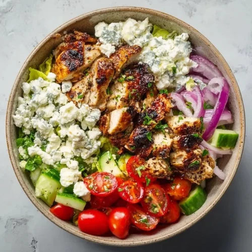 Delicious Low Carb Greek Chicken Bowls with fresh vegetables and flavorful seasoning.