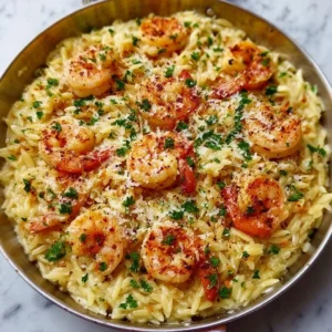 One Pan Parmesan Orzo with Shrimp dish garnished and ready to serve.